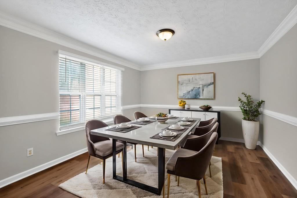 3737 Waldrop Road Decatur, GA 30034 - Photo 15 of 28 a view of a dining room with furniture window and wooden floor