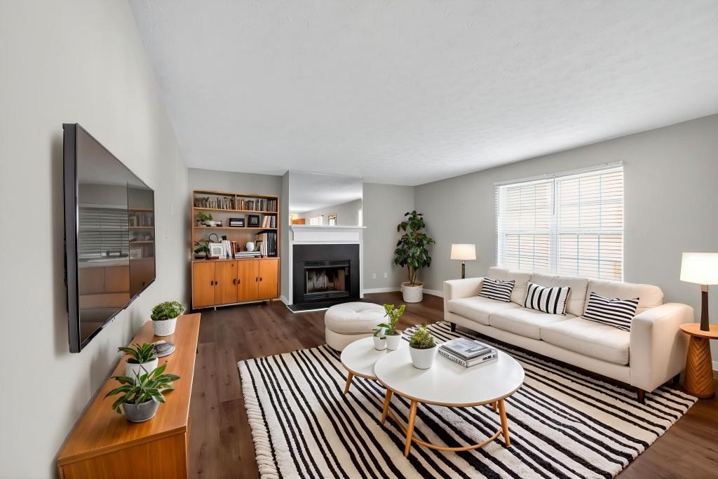 3737 Waldrop Road Decatur, GA 30034 - Photo 18 of 28 a living room with furniture and a fireplace