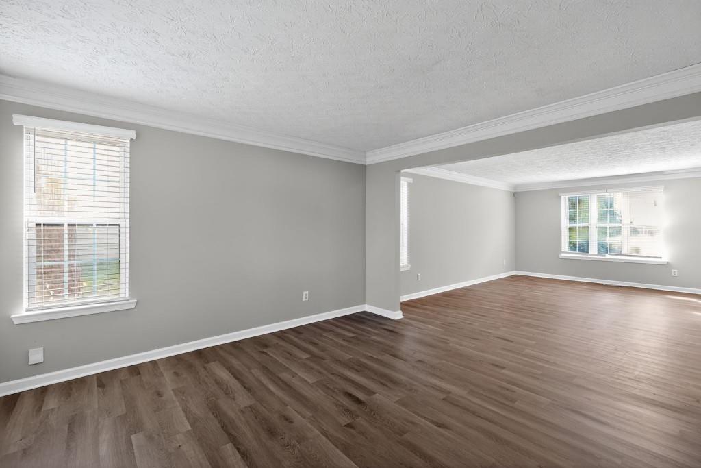 3737 Waldrop Road Decatur, GA 30034 - Photo 23 of 28 a view of an empty room with wooden floor and a window