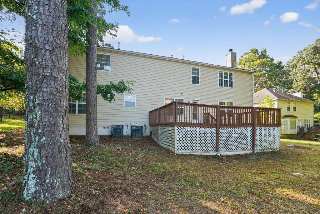 3737 Waldrop Road Decatur, GA 30034 - Photo 6 of 28 a view of backyard with a garden and trees