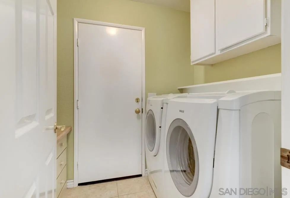 2762 Jody Place Escondido, CA 92027 - Photo 19 of 25 a utility room with dryer and washer