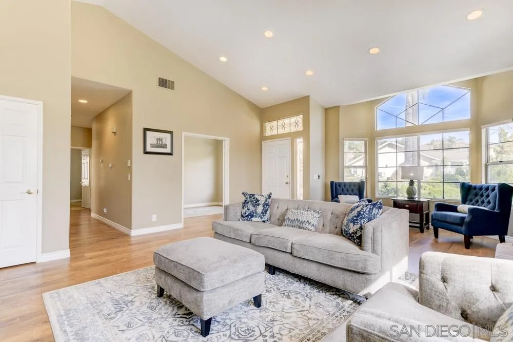2762 Jody Place Escondido, CA 92027 - Photo 3 of 25 a living room with furniture and a large window