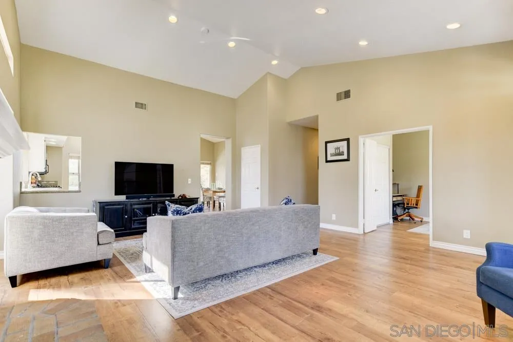 2762 Jody Place Escondido, CA 92027 - Photo 4 of 25 a living room with furniture and a flat screen tv