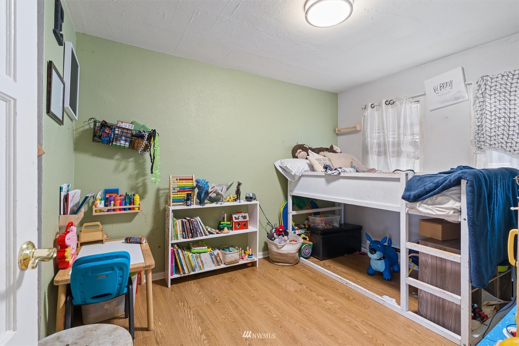 1005 Lane Place, Unit A&B Everett, WA 98203 - Photo 12 of 31 a view of a workspace with furniture and toys