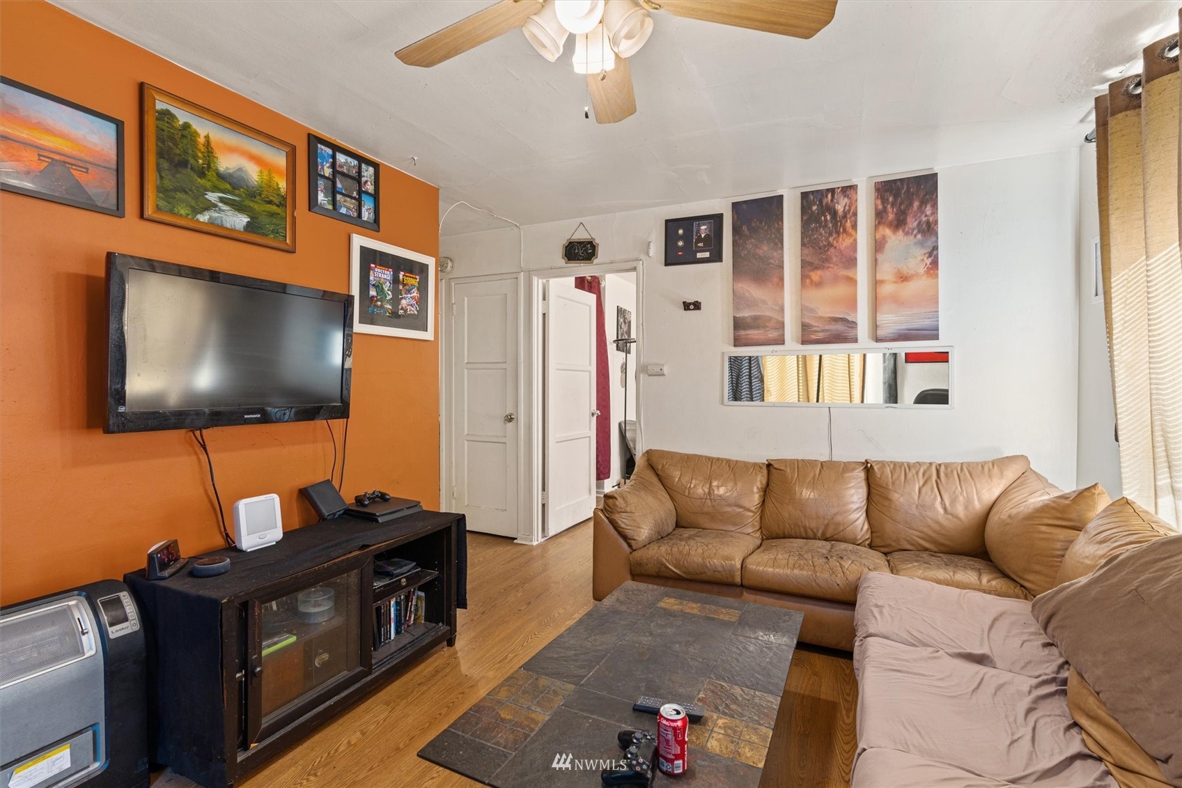 1005 Lane Place, Unit A&B Everett, WA 98203 - Photo 15 of 31 a living room with furniture and a flat screen tv