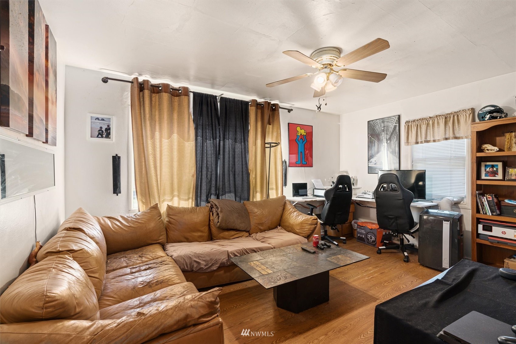 1005 Lane Place, Unit A&B Everett, WA 98203 - Photo 16 of 31 a living room with furniture ceiling fan and a window