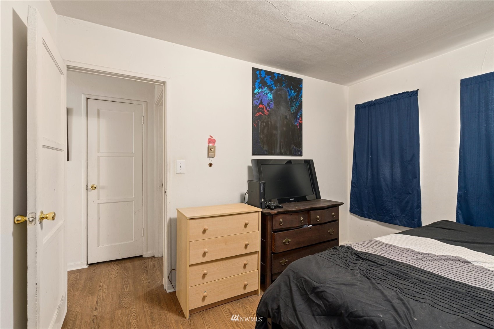 1005 Lane Place, Unit A&B Everett, WA 98203 - Photo 21 of 31 a bedroom with a bed and a closet
