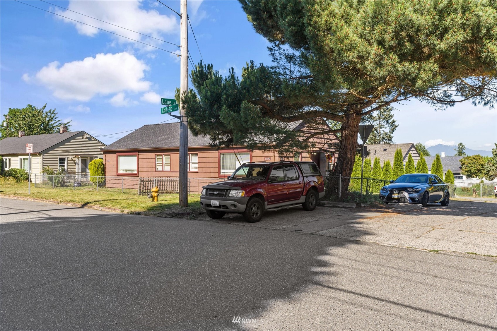 1005 Lane Place, Unit A&B Everett, WA 98203 - Photo 30 of 31 a view of a street with a car parked in front of it