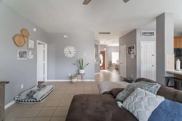 a living room with furniture and a table