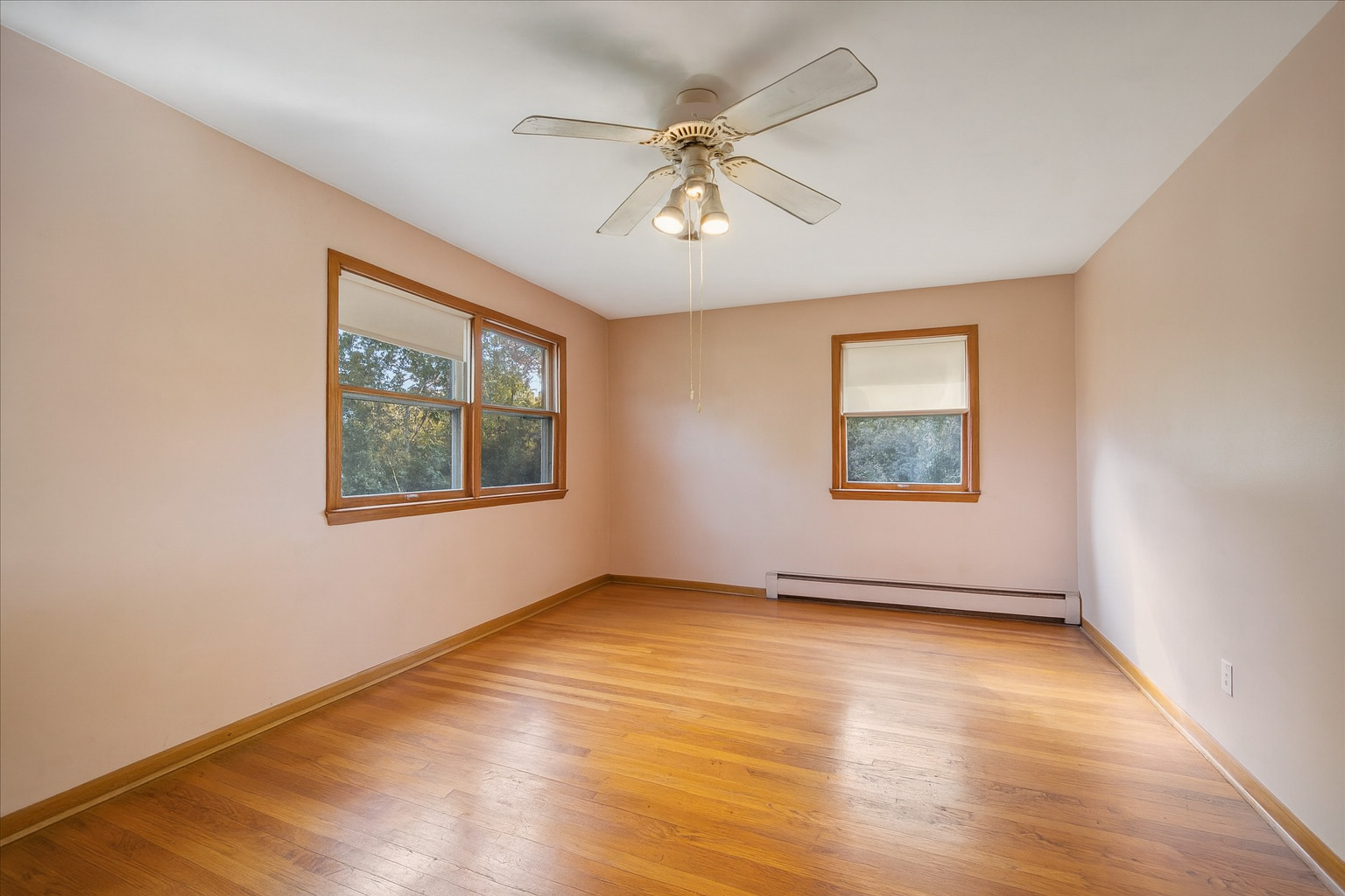 1068 North Hainesville Road Round Lake, IL 60073 - Photo 17 of 31 wooden floor in an empty room with a window
