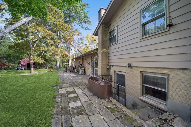 a view of a back yard of the house