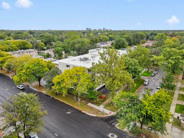 a view of parking garage with cars