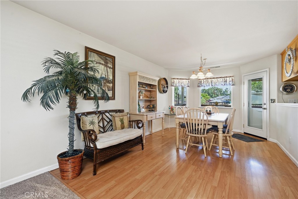 18650 Horseshoe Road Hidden Valley Lake, CA 95467 - Photo 6 of 26 a living room with furniture and a wooden floor