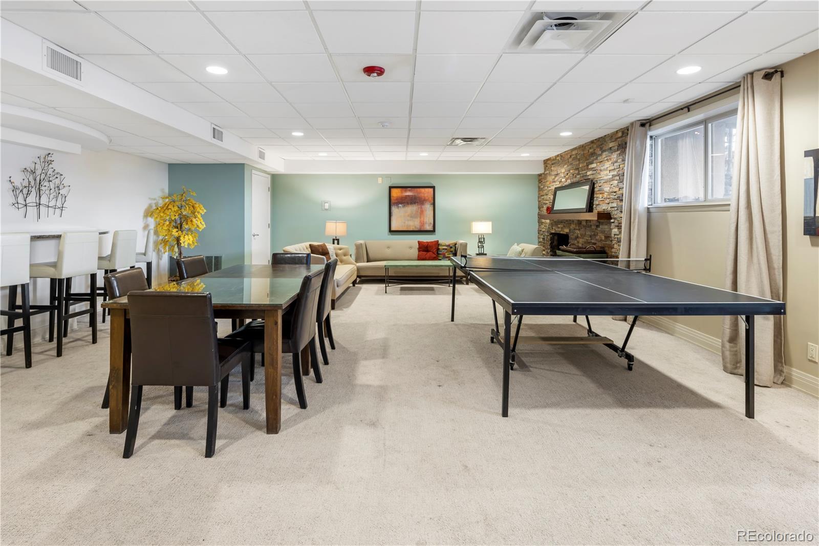 2 Adams Street, Unit 108 Denver, CO 80206 - Photo 35 of 36 a view of a dining room with furniture