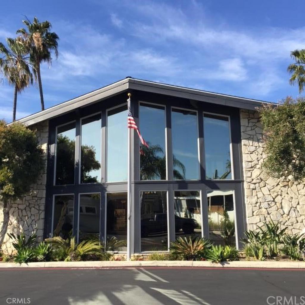 283 Cambridge Way Newport Beach, CA 92660 - Photo 19 of 33 front view of a house with a street