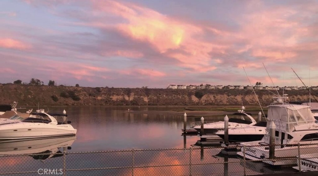 283 Cambridge Way Newport Beach, CA 92660 - Photo 32 of 33 a view of a lake with a terrace