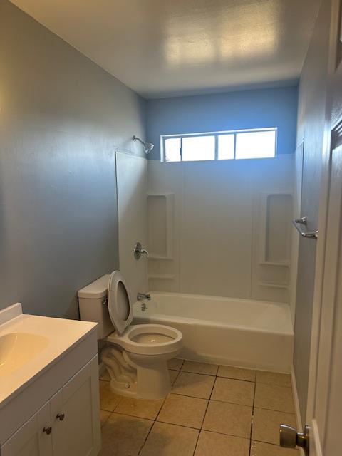 5558 Lake Alpaugh Ca Alpaugh, CA 93201 - Photo 11 of 14 a bathroom with a granite countertop sink a toilet and shower