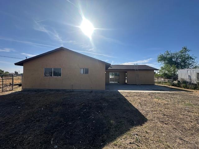 5558 Lake Alpaugh Ca Alpaugh, CA 93201 - Photo 13 of 14 a view of a house with backyard and garden