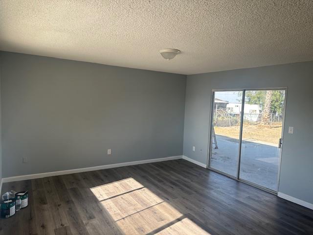 5558 Lake Alpaugh Ca Alpaugh, CA 93201 - Photo 4 of 14 an empty room with wooden floor and windows