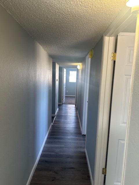 5558 Lake Alpaugh Ca Alpaugh, CA 93201 - Photo 8 of 14 a view of a hallway with wooden floor
