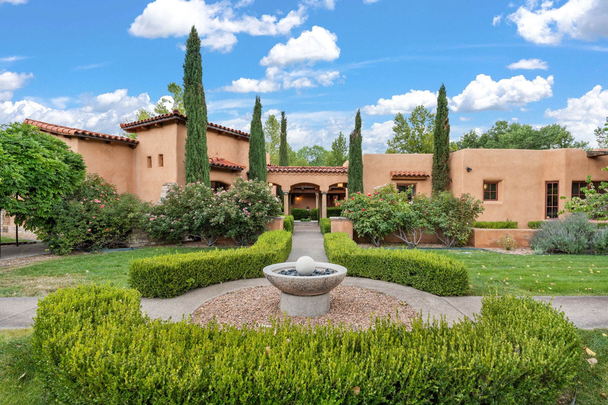 Italian Inspired Villa wrapped around a lush courtyard