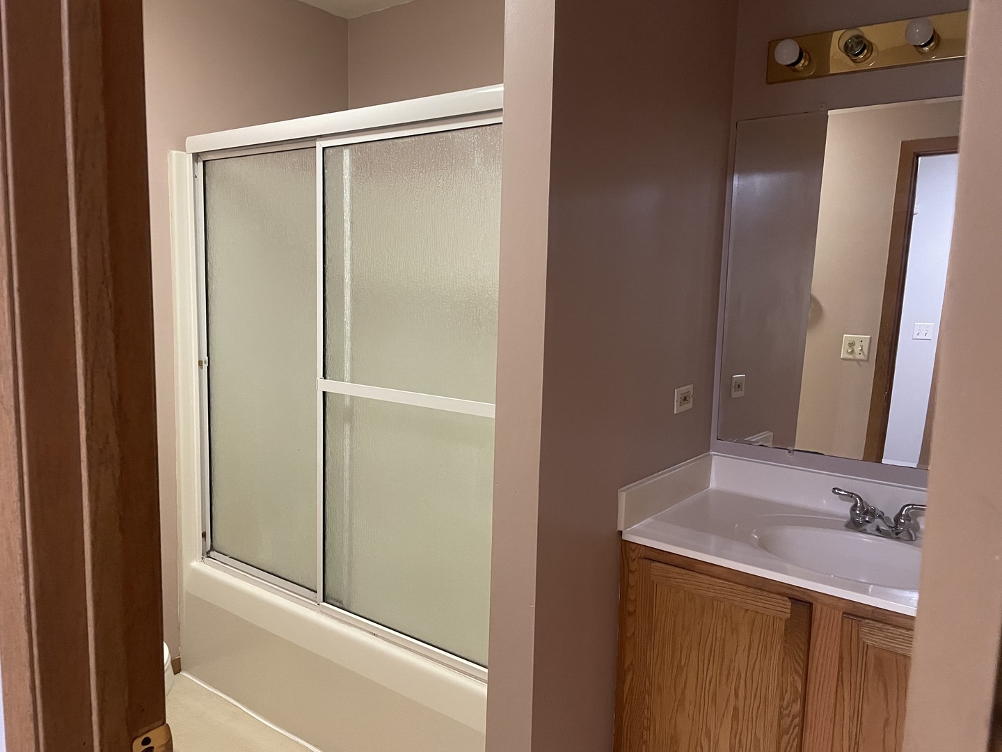 10073 West Crissy Avenue Beach Park, IL 60099 - Photo 6 of 9 a bathroom with a bathtub and a sink