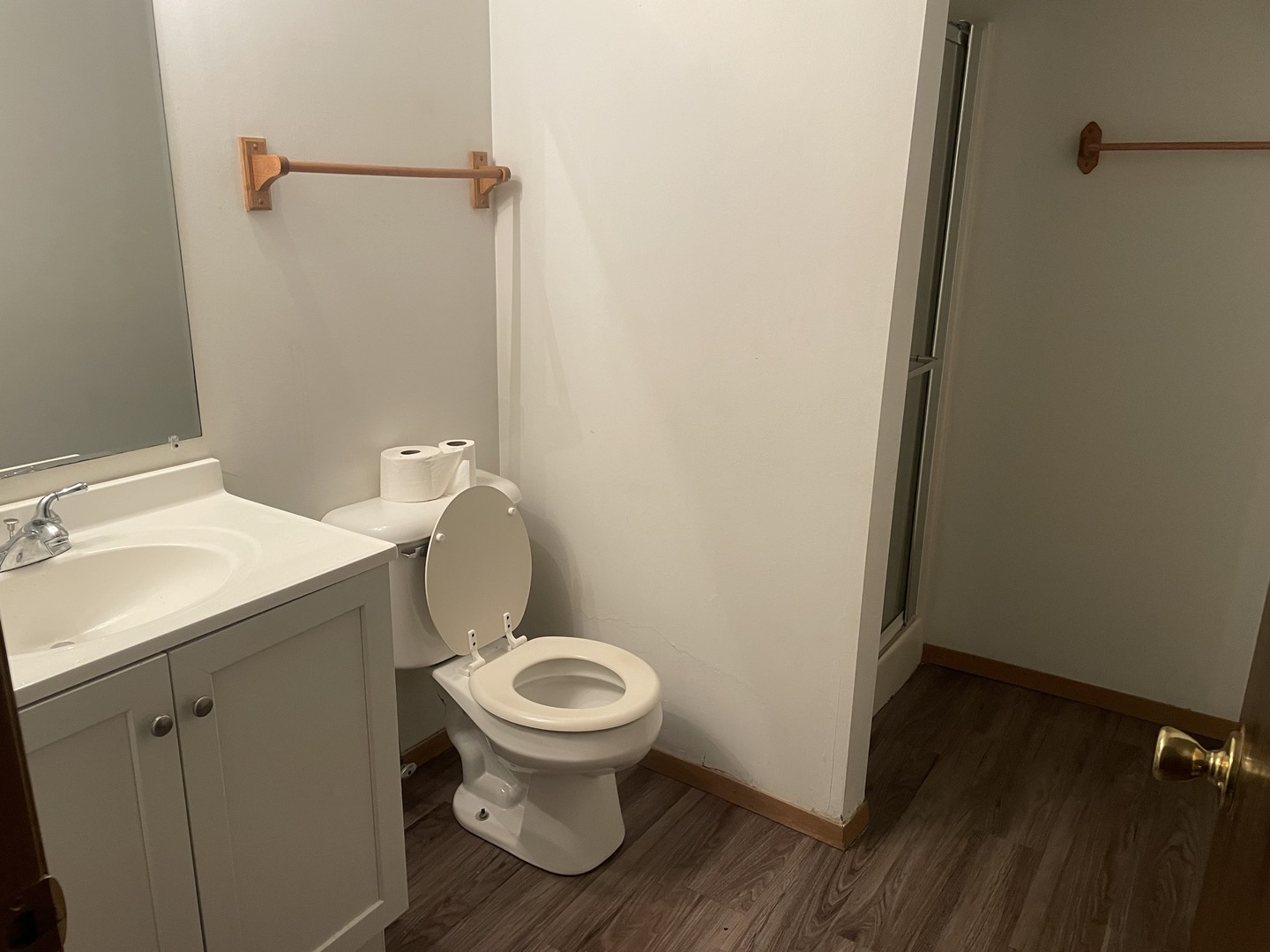 10073 West Crissy Avenue Beach Park, IL 60099 - Photo 7 of 9 a white toilet sitting next to a bathroom sink
