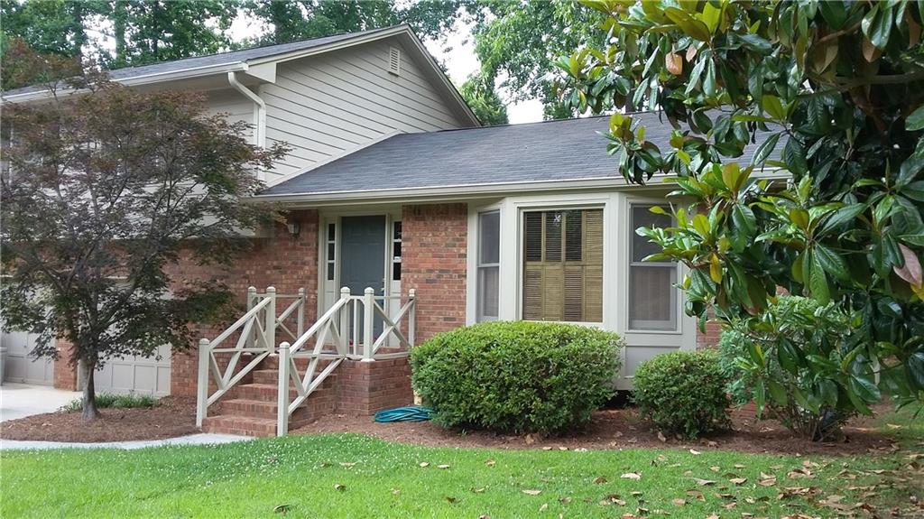 3110 Medley Ridge Decatur, GA 30033 - Photo 1 of 1 Brick facade, a large Magnolia and a mature Japanese Maple provide a welcoming entrance.
