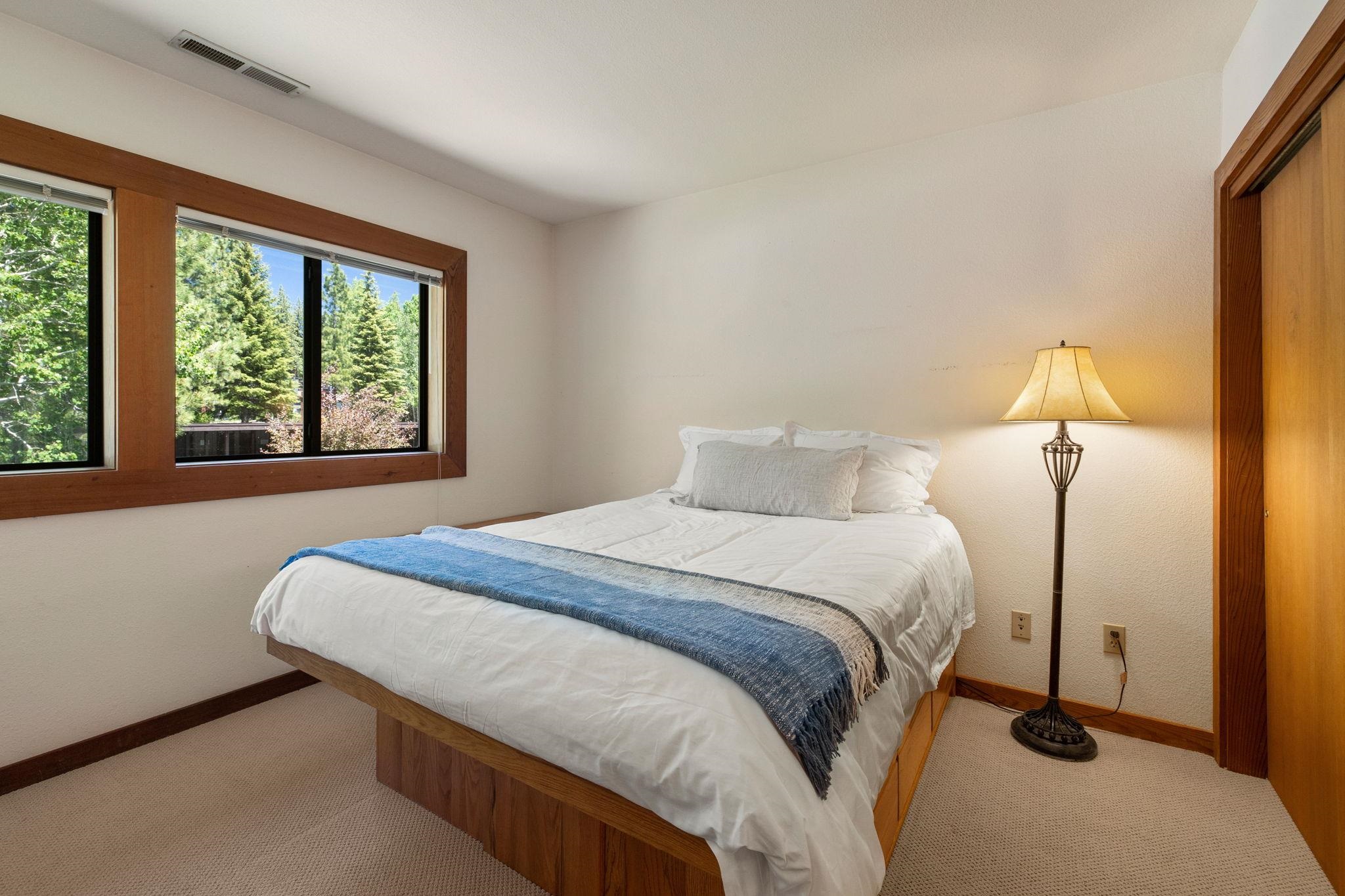 1591 Olympic Vly Road, Unit 29 Olympic Valley, CA 96146 - Photo 3 of 28 a bedroom with a bed and a window
