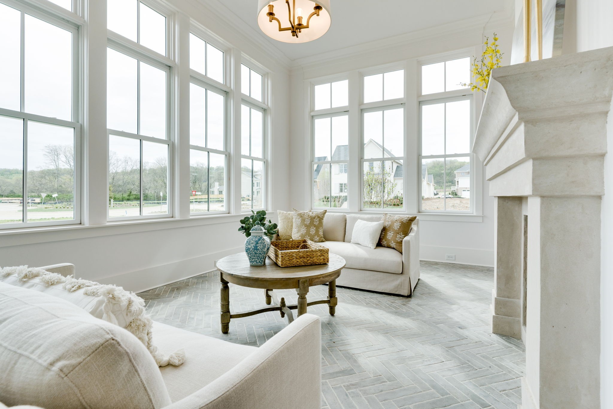 6076 Pasquo Road Nashville, TN 37221 - Photo 17 of 69 a living room with furniture and floor to ceiling windows