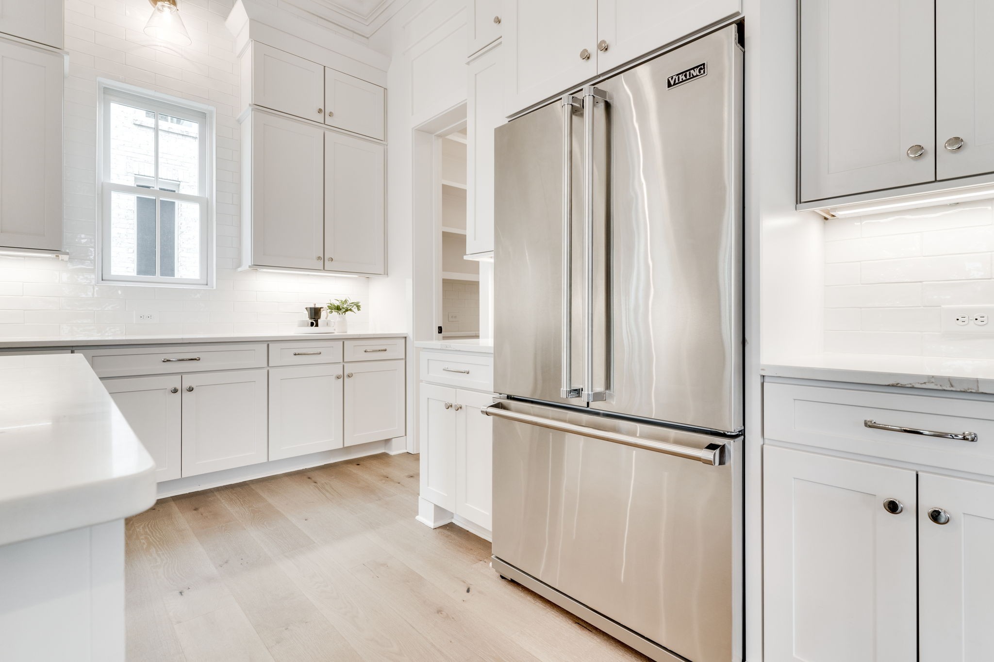 6076 Pasquo Road Nashville, TN 37221 - Photo 28 of 69 a kitchen with appliances cabinets and a window