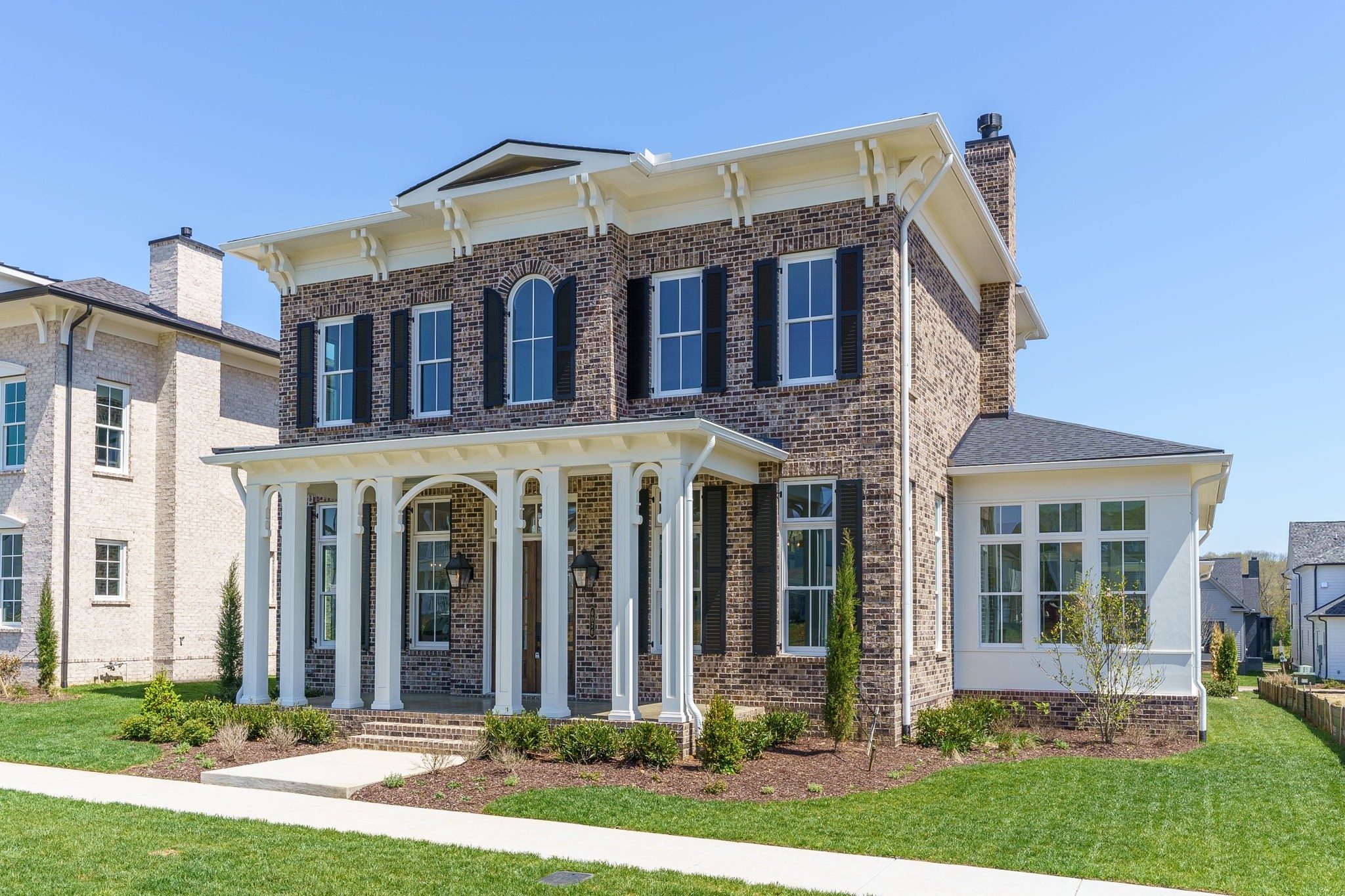 6076 Pasquo Road Nashville, TN 37221 - Photo 3 of 69 front view of a house with a yard