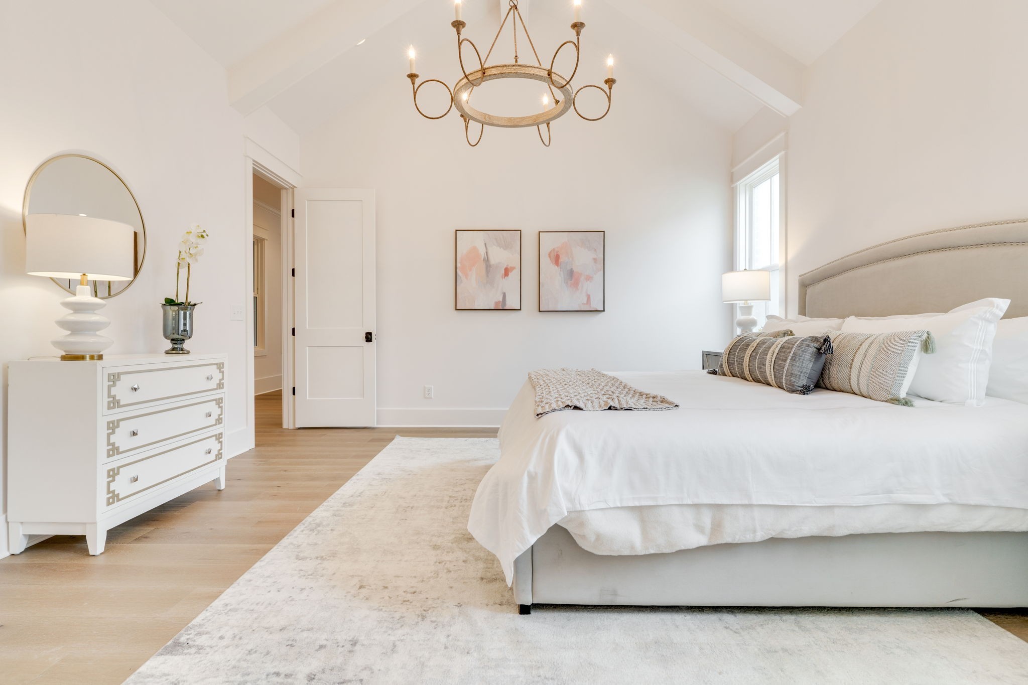 6076 Pasquo Road Nashville, TN 37221 - Photo 33 of 69 a bedroom with a bed and dresser