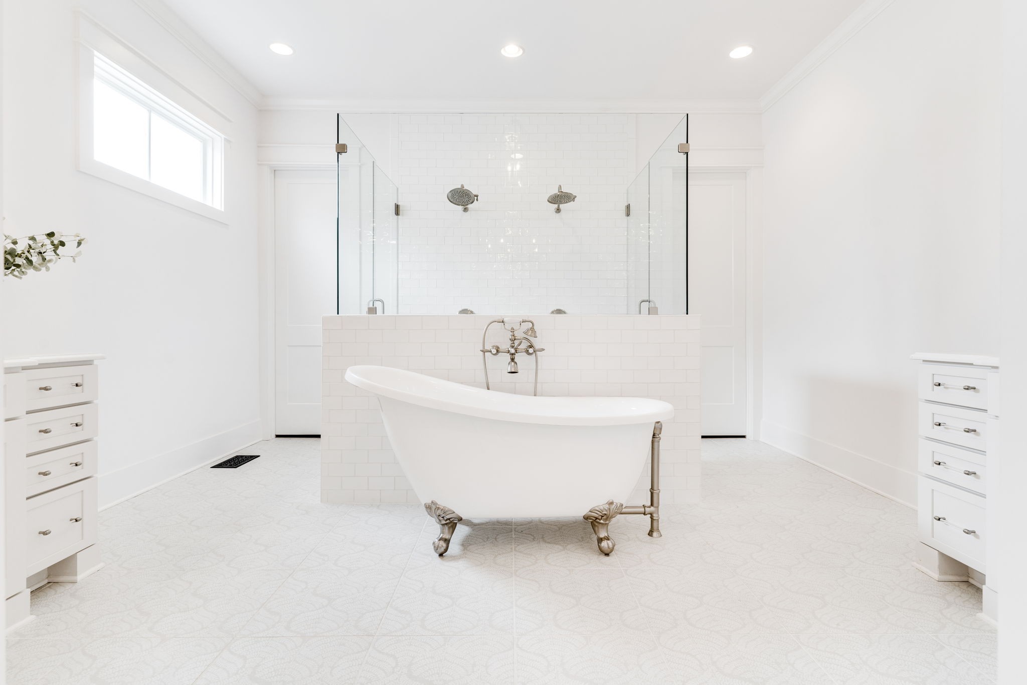 6076 Pasquo Road Nashville, TN 37221 - Photo 34 of 69 a bathroom with a sink a mirror and a shower