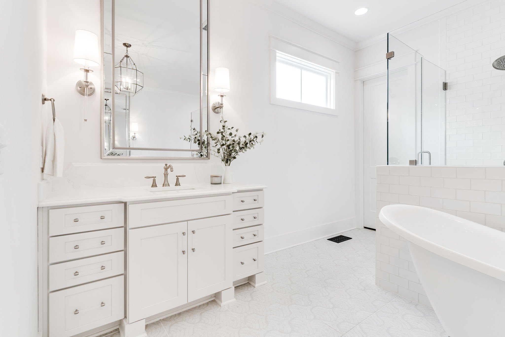 6076 Pasquo Road Nashville, TN 37221 - Photo 36 of 69 a bathroom with a sink double vanity and a mirror