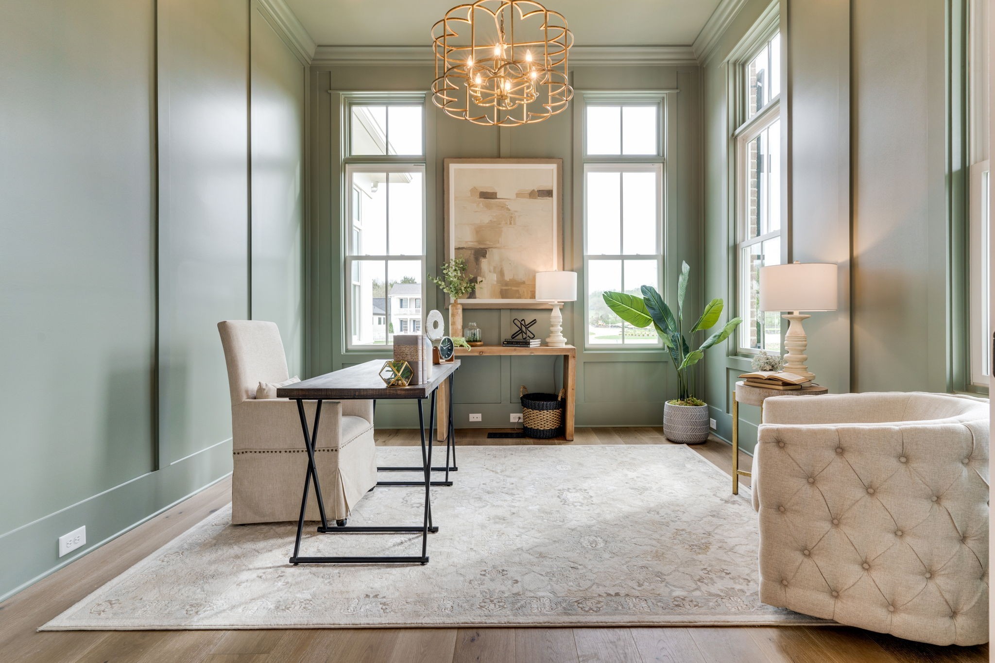 6076 Pasquo Road Nashville, TN 37221 - Photo 4 of 69 a living room with furniture and a chandelier