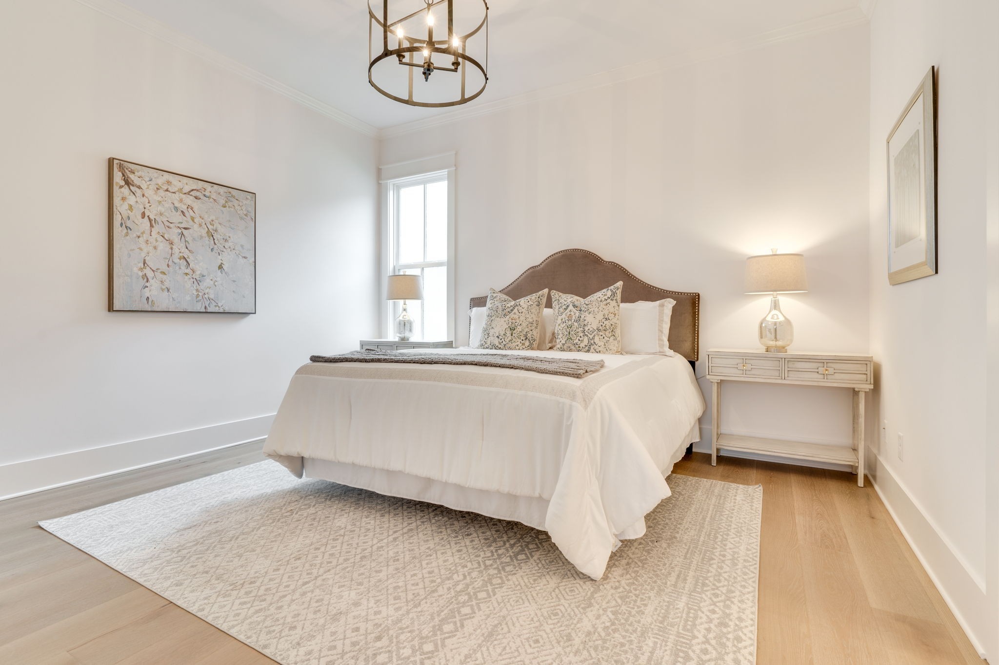 6076 Pasquo Road Nashville, TN 37221 - Photo 42 of 69 a bedroom with a bed and a night stand