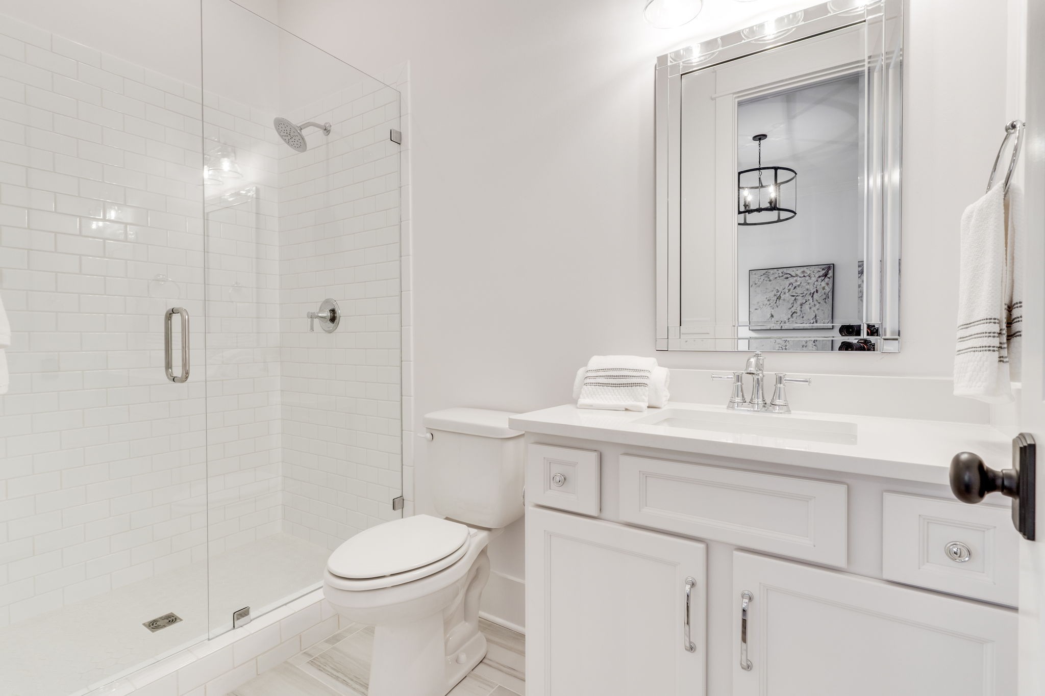 6076 Pasquo Road Nashville, TN 37221 - Photo 44 of 69 a bathroom with a sink a toilet and shower