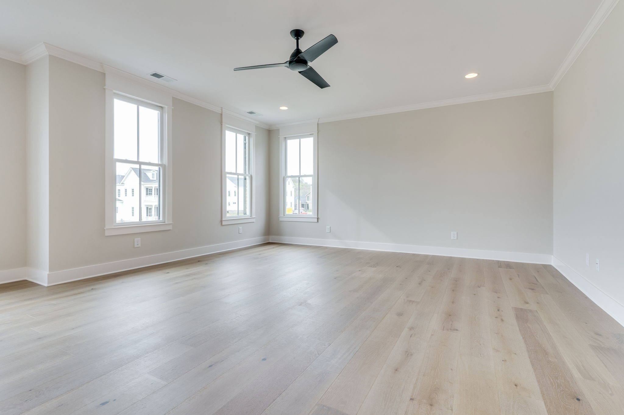 6076 Pasquo Road Nashville, TN 37221 - Photo 50 of 69 an empty room with wooden floor and windows