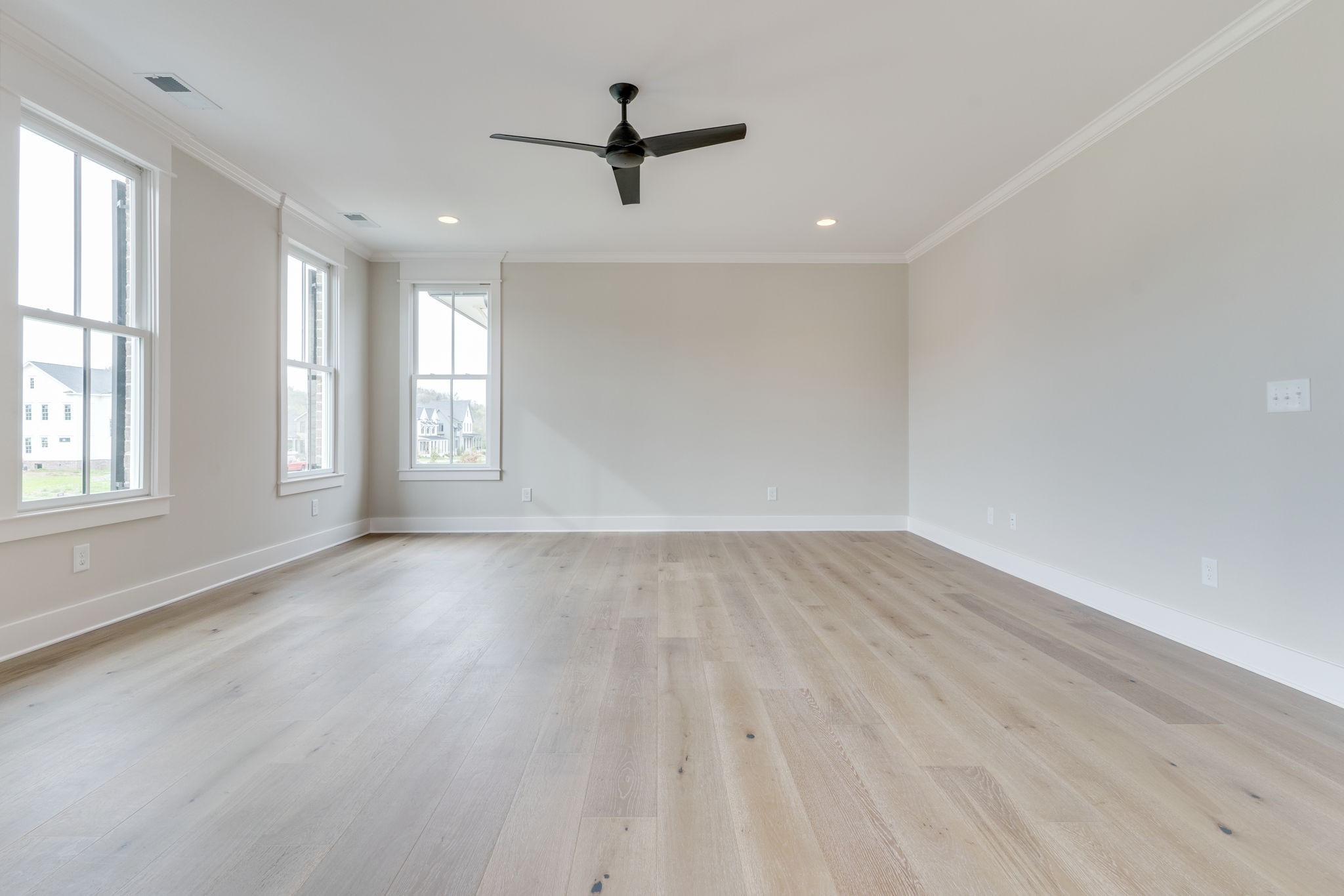 6076 Pasquo Road Nashville, TN 37221 - Photo 51 of 69 wooden floor in an empty room with a window