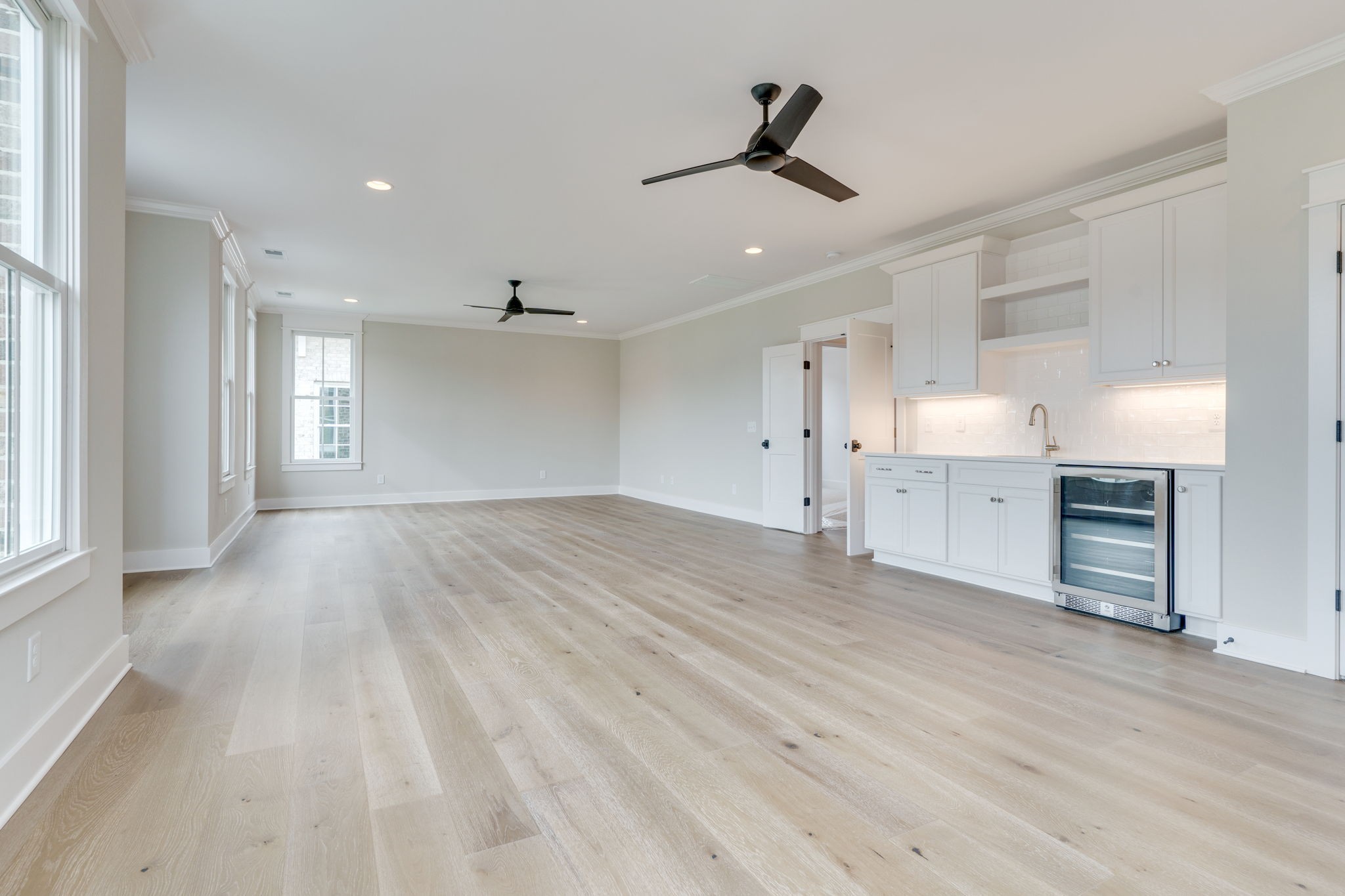 6076 Pasquo Road Nashville, TN 37221 - Photo 54 of 69 a view of empty room with wooden floor and window