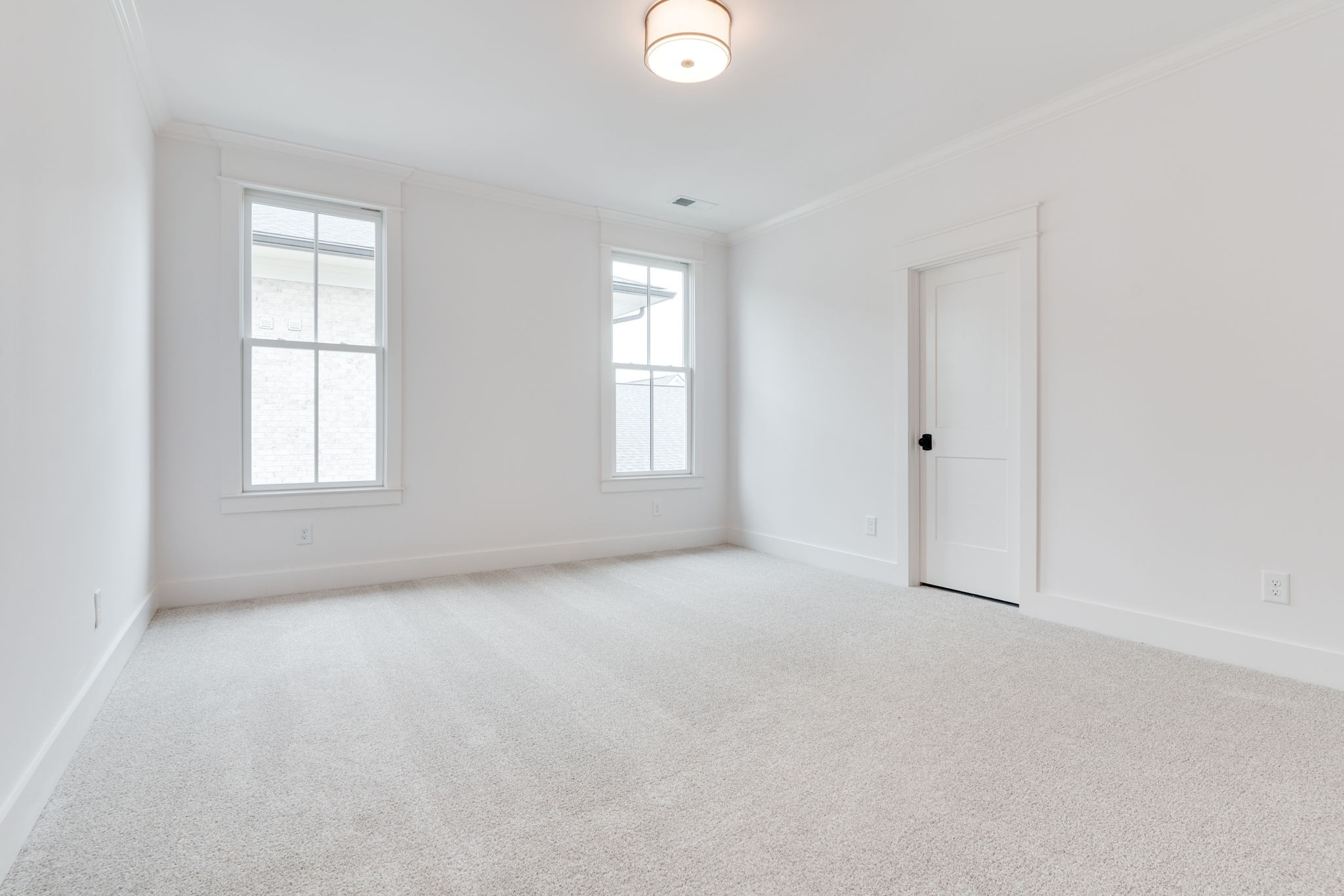 6076 Pasquo Road Nashville, TN 37221 - Photo 57 of 69 an empty room with windows and closet