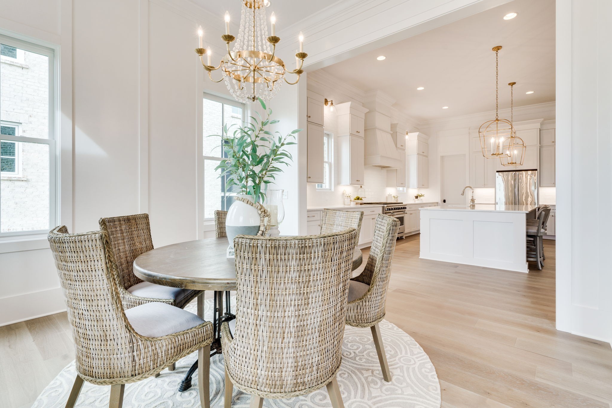 6076 Pasquo Road Nashville, TN 37221 - Photo 8 of 69 a view of a dining room with furniture and wooden floor