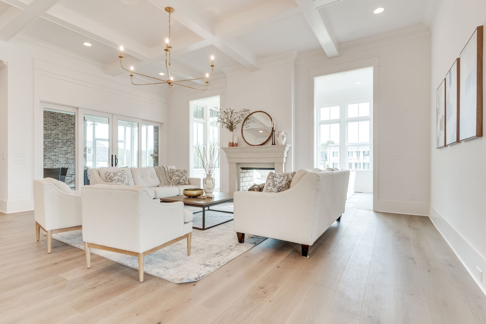 6076 Pasquo Road Nashville, TN 37221 - Photo 9 of 69 a living room with furniture a large window and wooden floor