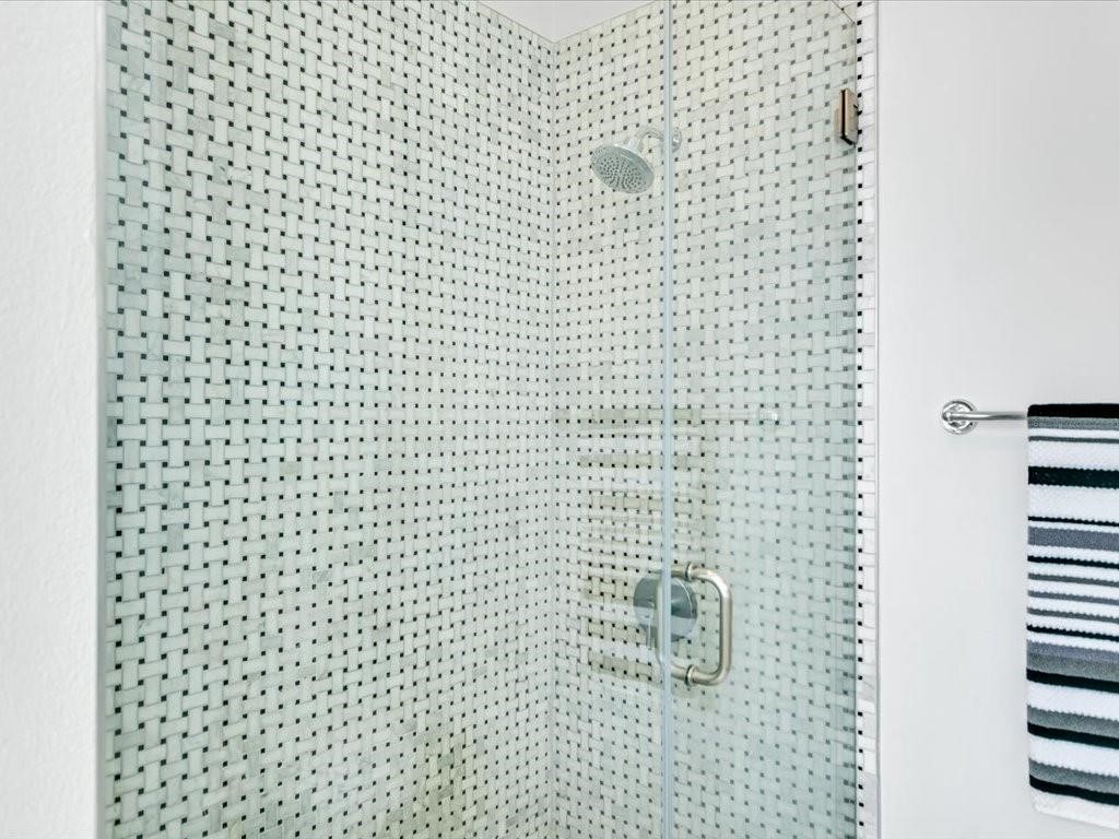 800 Rosedale Terrace, Unit B Austin, TX 78704 - Photo 21 of 40 Walk-in shower in primary bath.