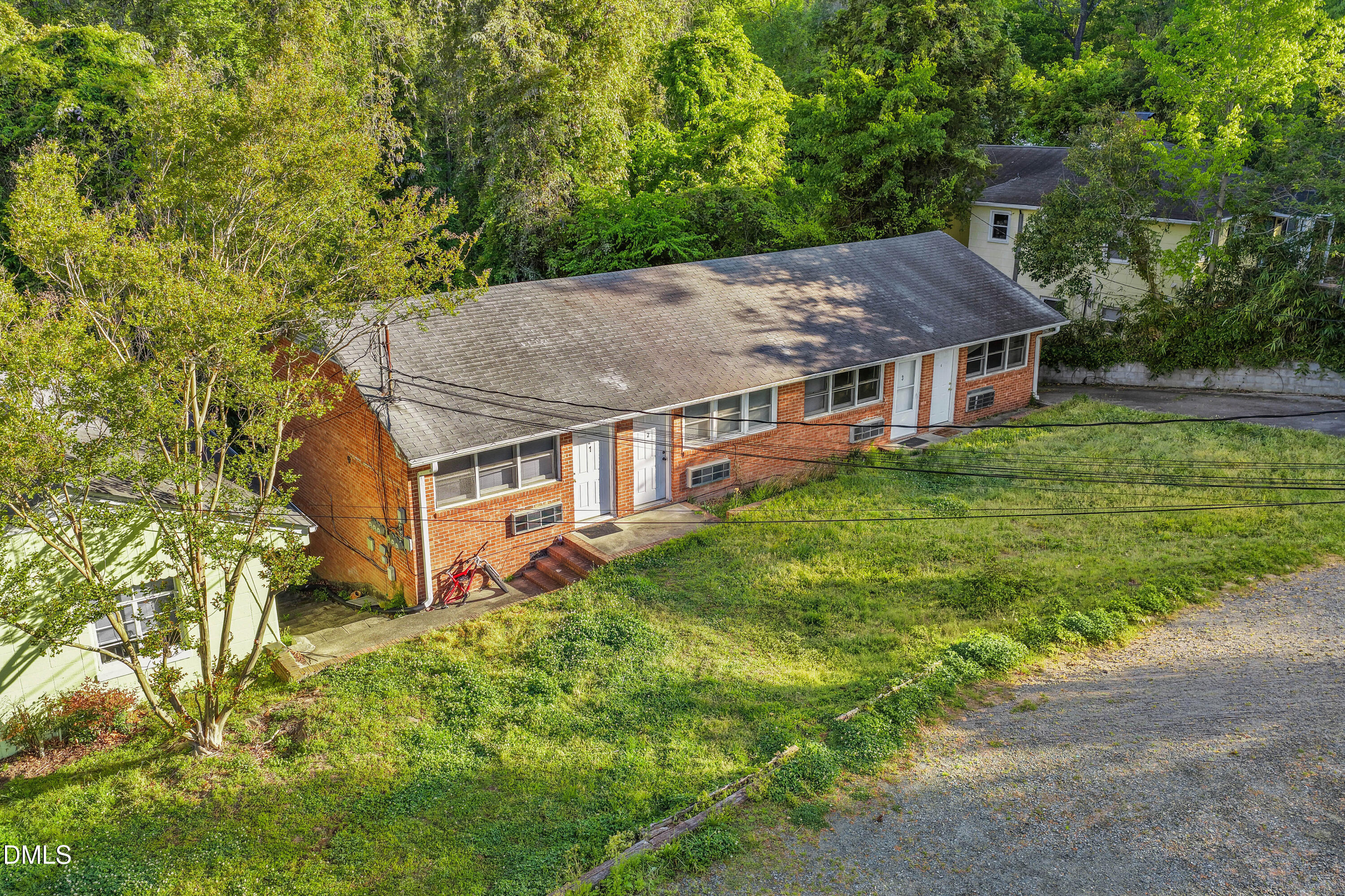 210 Purefoy Road, Unit 16 Chapel Hill, NC 27514 - Photo 3 of 11 an aerial view of a house with a big yard