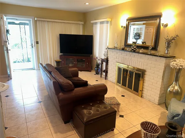 a kitchen with stainless steel appliances a refrigerator and wooden cabinets