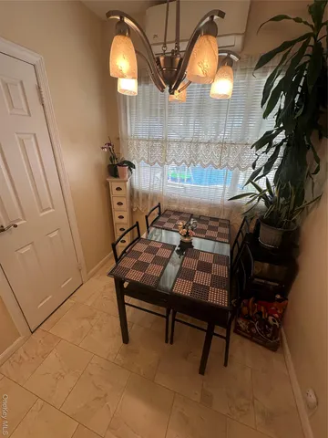 a kitchen with stainless steel appliances a refrigerator sink and stove