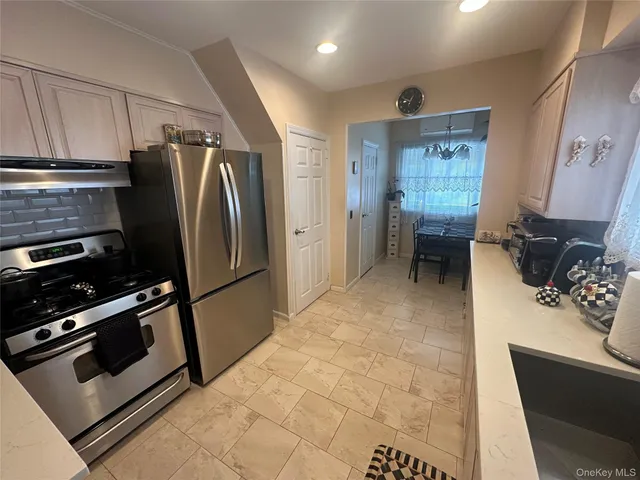 a room with furniture and a window