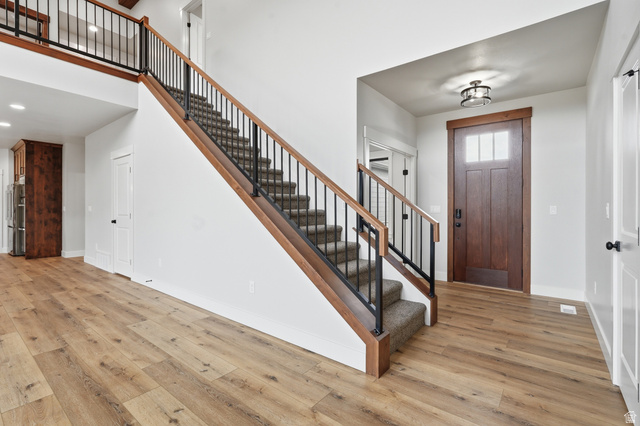 2970 North Mahogany Vly Road Logan, UT 84341 - Photo 4 of 39 Entrance foyer with light wood finished floors, a high ceiling, and recessed lighting